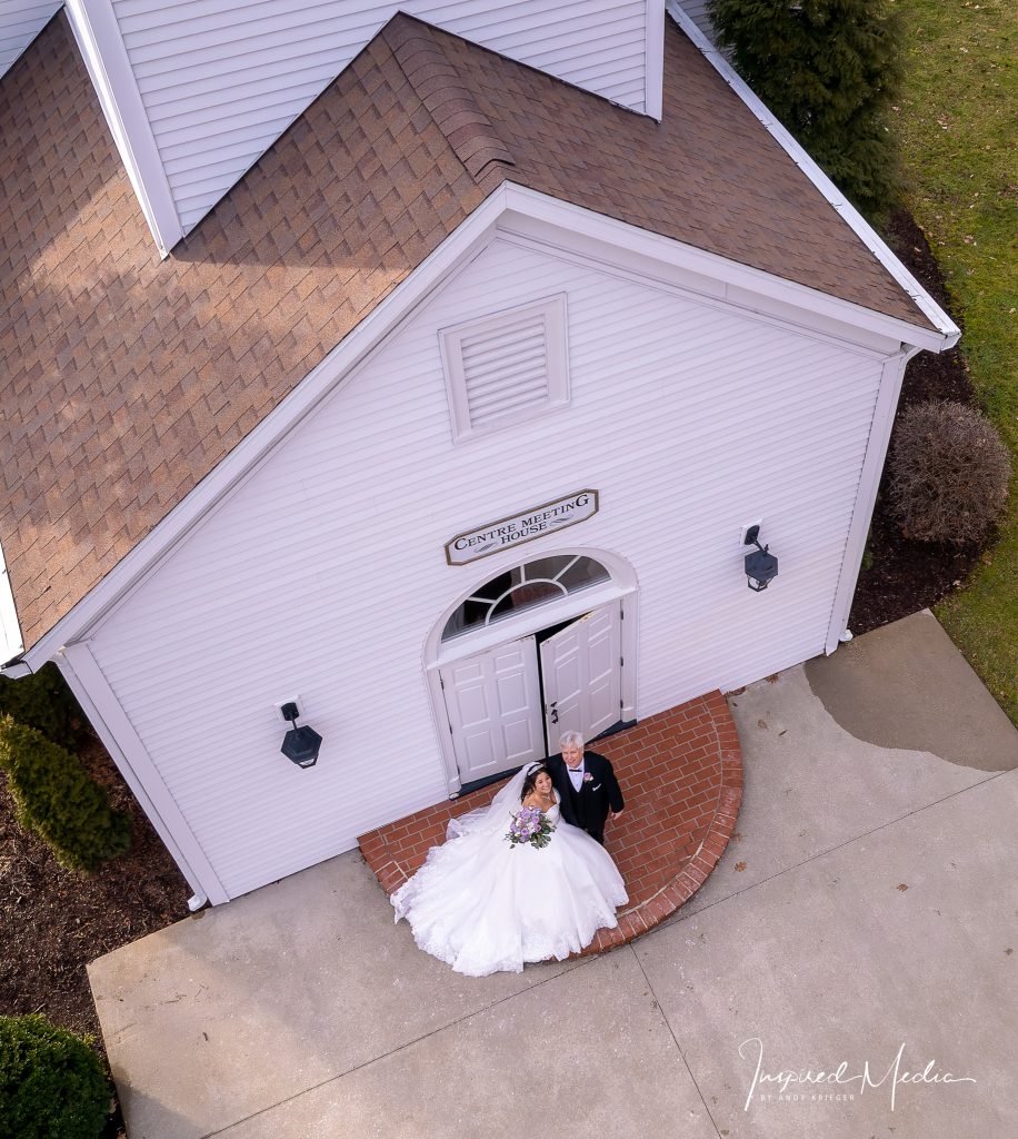 Aerial drone photo outside chapel of bride and groom