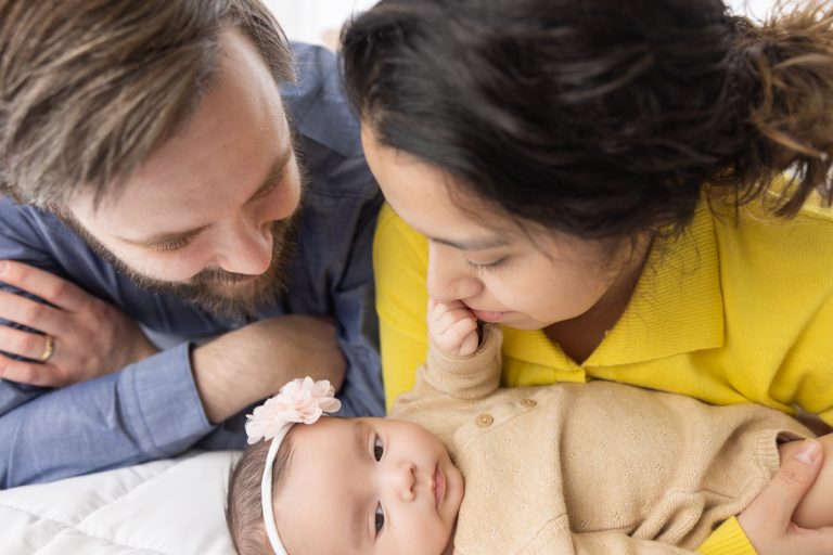 Infant with mom and dad