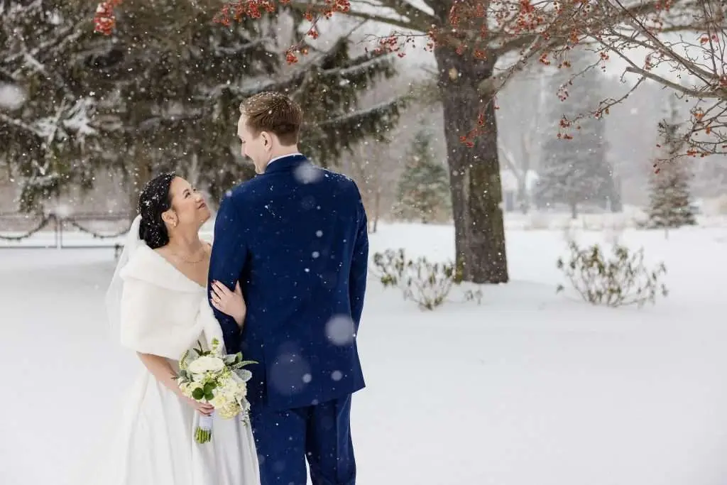 Beautiful snowy couple at Ivy House