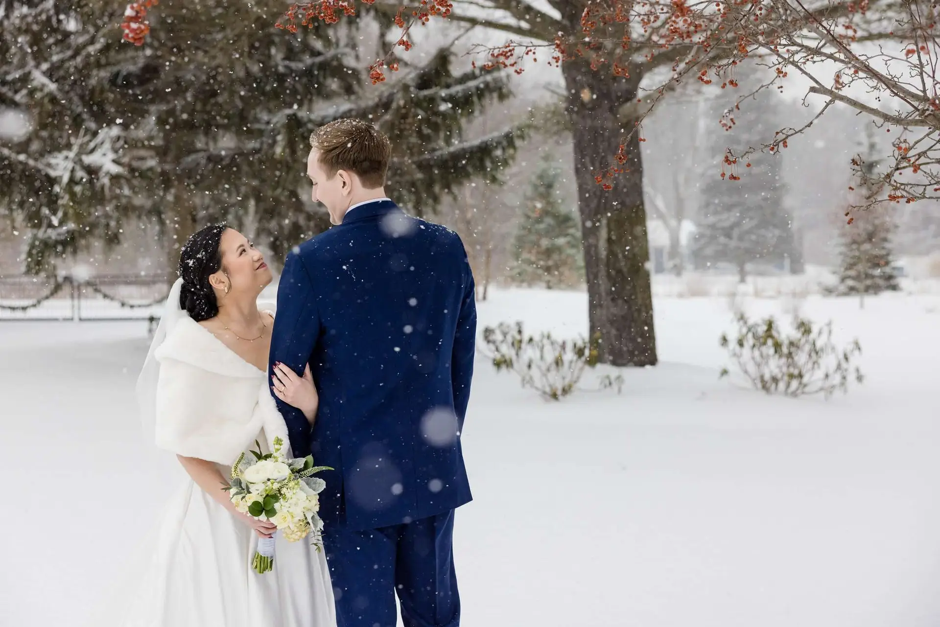Beautiful snowy couple at Ivy House