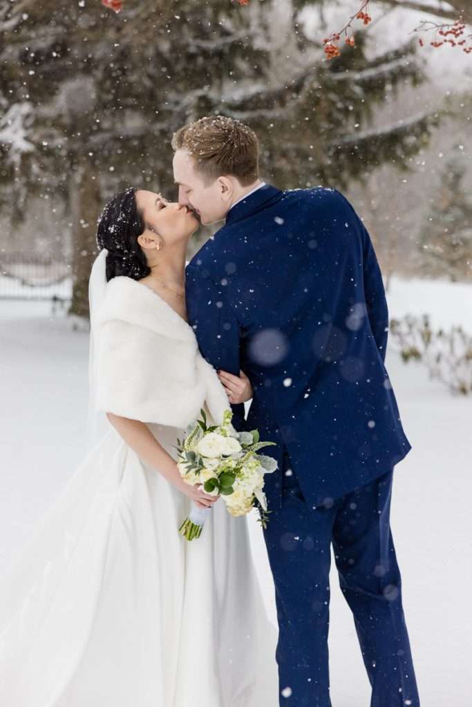 winter kiss at The Ivy House, Kalamazoo wedding photography