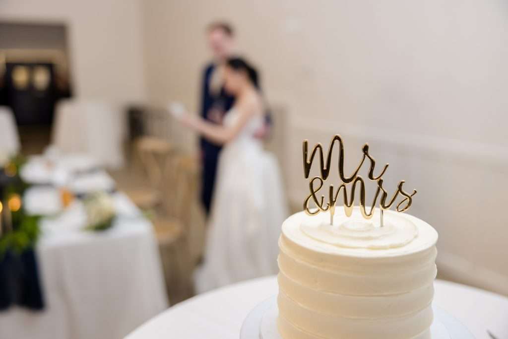 Couple greeting guest at The Ivy House, Kalamazoo wedding photography