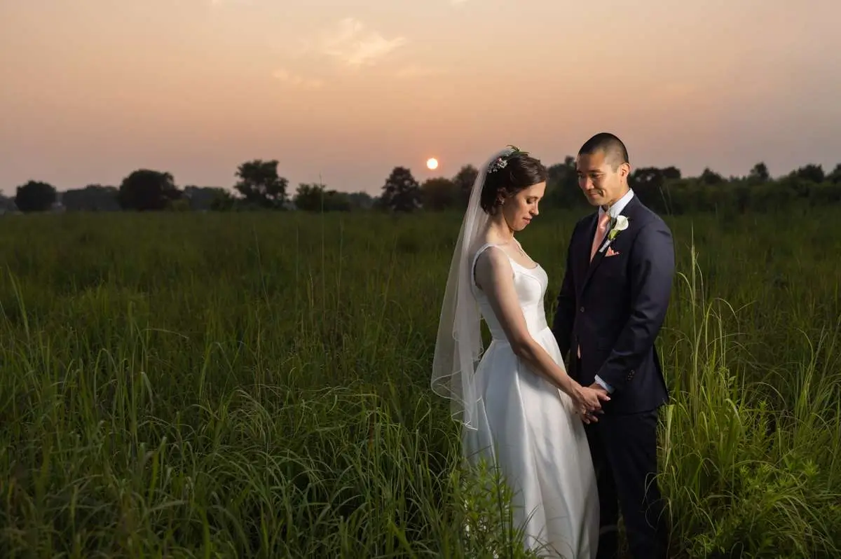 dramatic couple photo at Couple at Asylum Lake Preserve golden hour