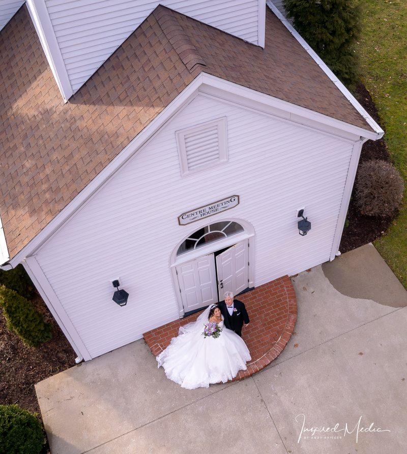 Aerial drone photo outside chapel of bride and groom