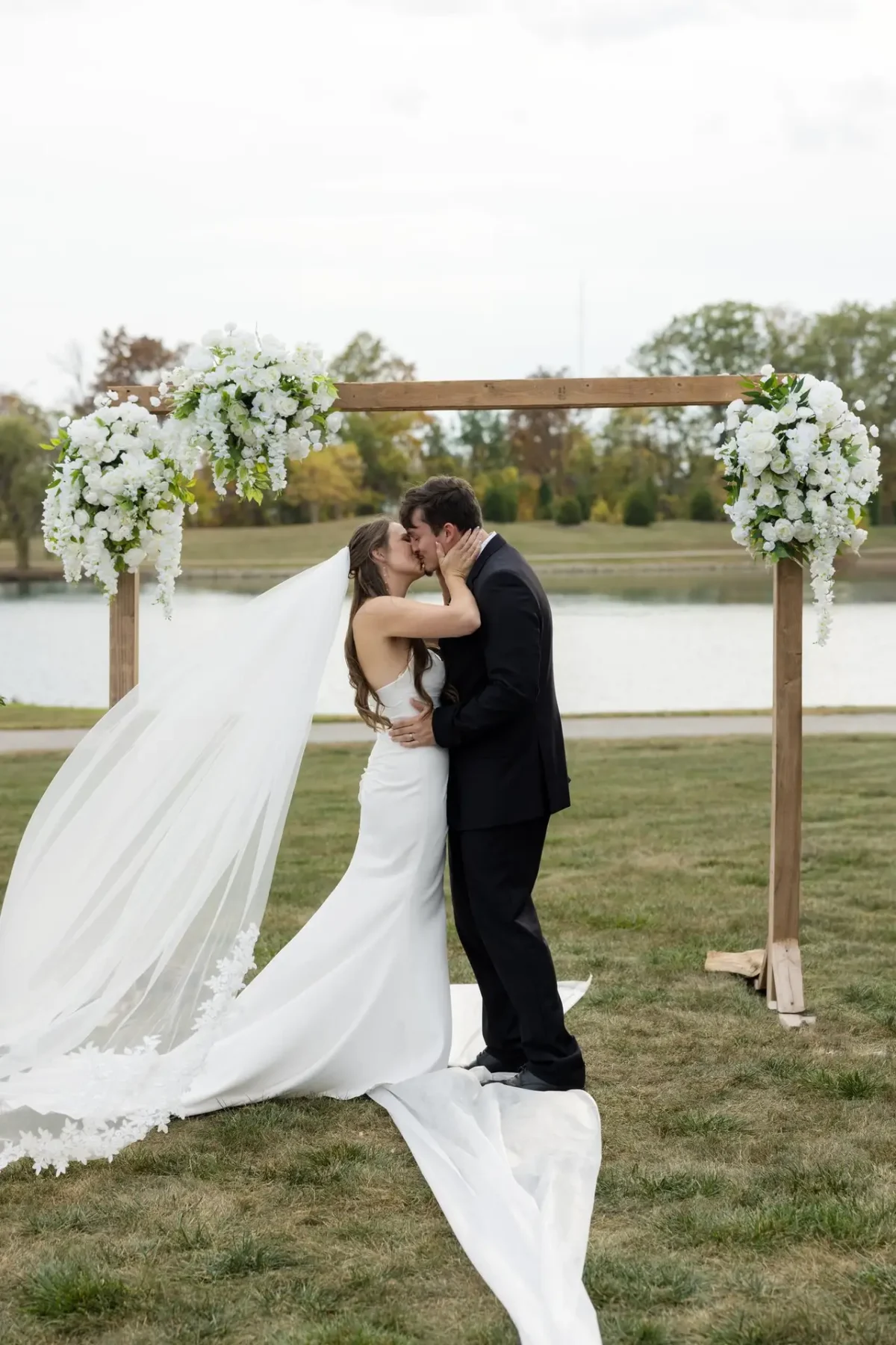 couple first kiss at The Lodge at Camp Red Cedar photographed by Andy Krieger from Inspired Media