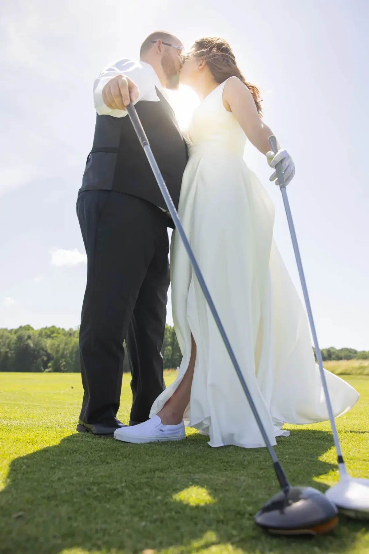 Couple on driving range at Beeches Golf Club photographed by Andy Krieger of Inspired Media
